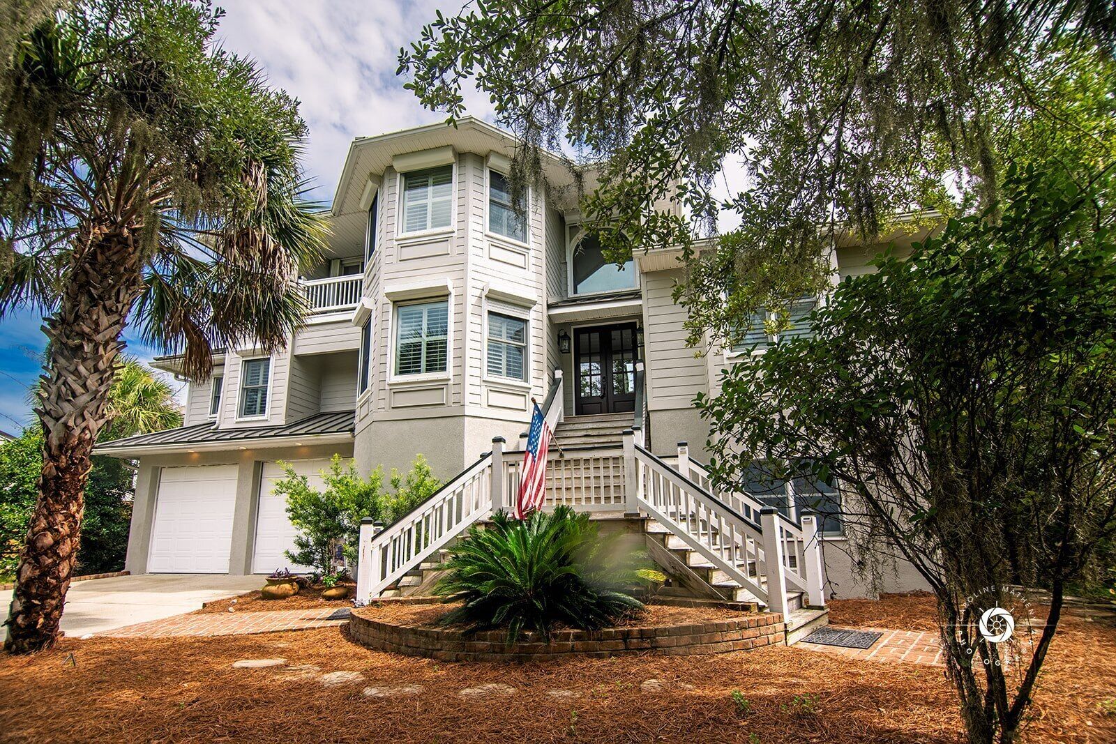 Low Country Home w/ Creek & Ocean views, dock, & indoor / outdoor living spaces