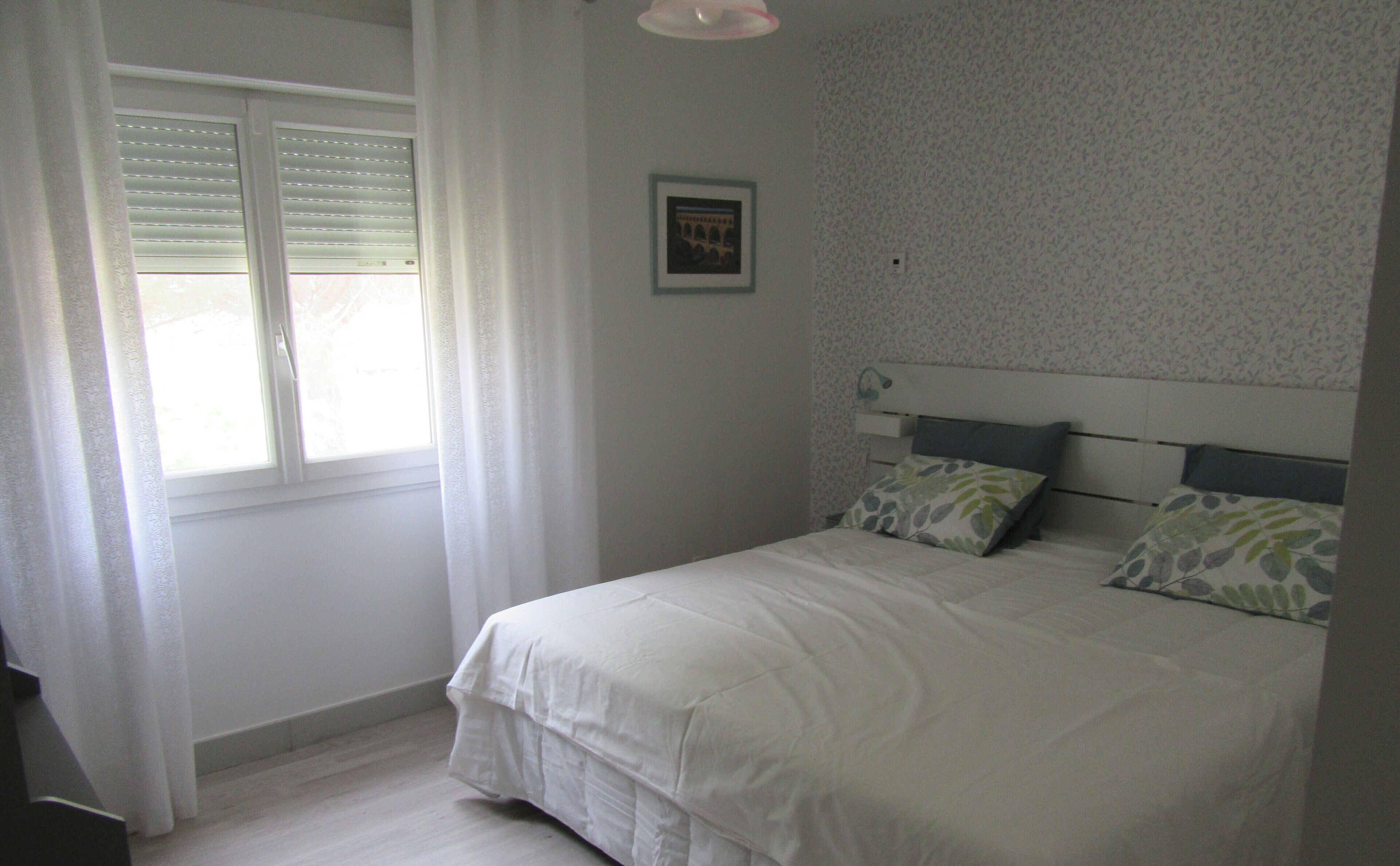 2 slaapkamers, een strijkplank/strijkijzer, gratis wifi, beddengoed