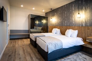 Standard Apartment, Multiple Beds, City View | 1 bedroom, in-room safe, desk, laptop workspace