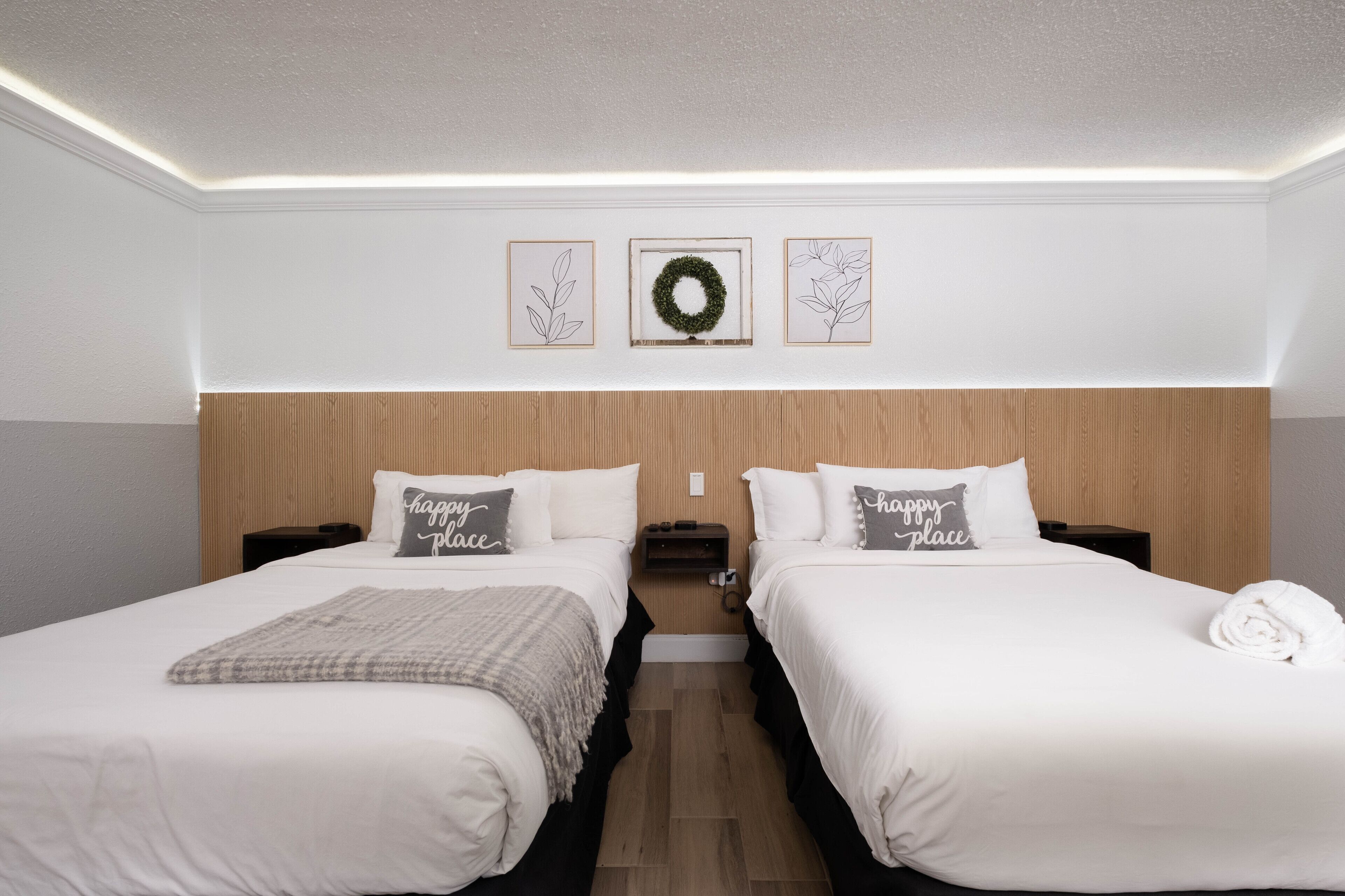 Premium bedding, desk, laptop workspace, iron/ironing board