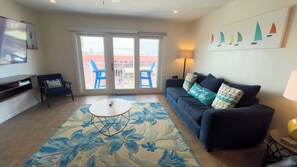 Apartment, 1 King Bed with Sofa bed, Pool Access, Beach View | Living area | TV - La Internacional 313 (South Padre Island)