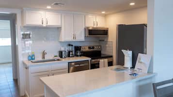 Apartment, 1 King Bed with Sofa bed, Pool Access, Beach View | Private kitchen | Fridge, microwave, oven, stovetop