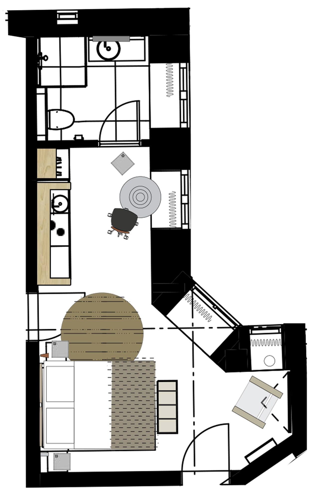 A floor plan with a kitchen, dining area, and a living room with a fireplace.