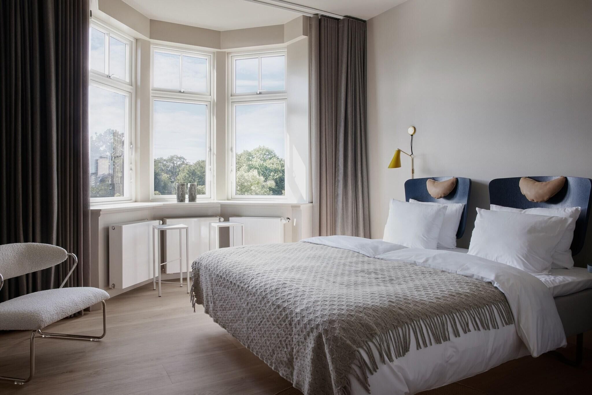 Premium bedding, desk, soundproofing, iron/ironing board