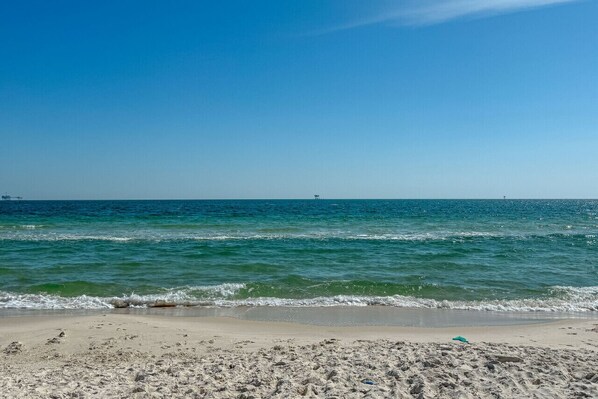 Enjoy a serene beach experience with access to the calm sea.