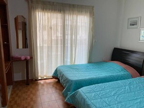 Apartment, 2 Twin Beds | 1 bedroom, free WiFi, bed sheets