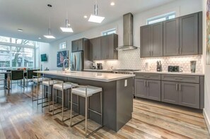 Townhome, 4 Bedrooms | Private kitchen - Spacious Tranquil Rooftop Pad on 8th by Music City Luxury Stays (Nashville)