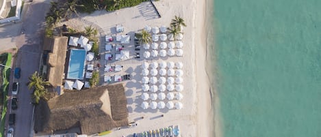 Beach nearby, white sand, beach cabanas