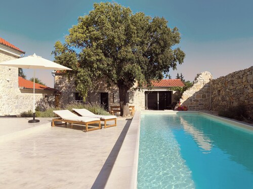 Little Stone House With Swimming Pool Under The Tree