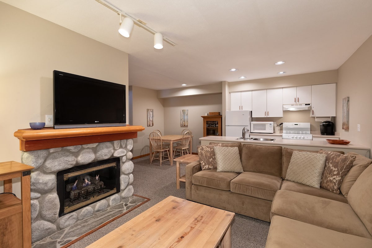Condo #19 | Living area | 46-inch TV with cable channels, fireplace
