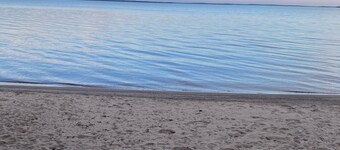 Spacious Cottage On Lake with Beach, Fire Pit, Kayaks, Pedal Boat & More!!