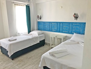 Chambre Quadruple Deluxe, vue jardin | 1 chambre, Wi-Fi gratuit