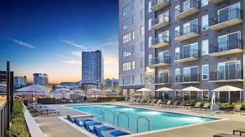 Outdoor pool, pool umbrellas, pool loungers