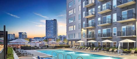 Outdoor pool, pool umbrellas, pool loungers