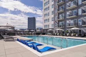 Outdoor pool, pool umbrellas, sun loungers