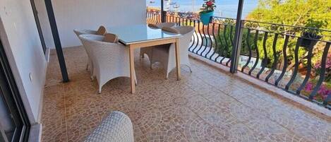Superior Triple Room, Sea View | Terrace/patio