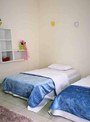 Apartemen, 2 Tempat Tidur Twin | 1 kamar tidur, Wi-Fi gratis, dan seprai linen