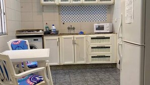 Apartemen, 2 Tempat Tidur Twin | Dapur pribadi | Lemari es, kompor, dan ketel listrik