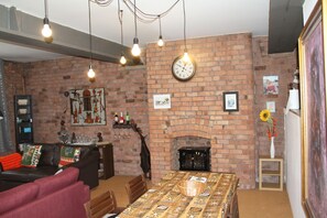 Apartment, Mehrere Betten | Wohnzimmer