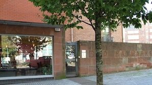 A brick building with a sign reading "Haymarket." - Captivating 2-bed Apartment in Liverpool (Liverpool)