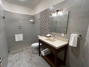 Superior Quadruple Room, 2 Double Beds | Bathroom | Shower, rainfall showerhead, towels, soap