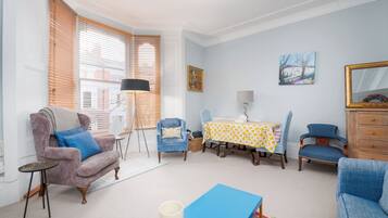 Apartment (1 Bedroom) | Living area | 24-inch TV with digital channels