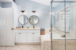 Combined shower/bathtub, jetted bath, hair dryer, towels