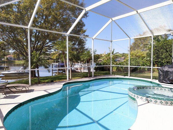 Outdoor pool, a heated pool - Quiet Lakeside Retreat -Peaceful Home w/ Pool (Bradenton)