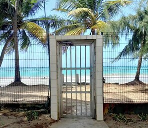 Na praia, toalhas de praia 