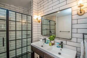 Bathtub, hair dryer, towels, soap