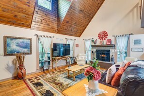 Smart TV, fireplace, books