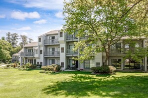 Exterior - Cozy Beach Front Condo | AC | Beach | Waterfront | (Traverse City)