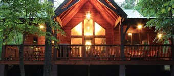 Step inside to see the lush décor and cathedral ceiling. Pool Table, Hot Tub!