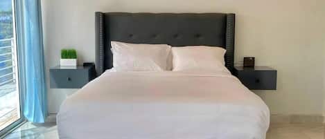 Plush Skyview Penthouse | Down duvets, in-room safe, blackout curtains, soundproofing