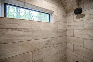 Combined shower/tub, hair dryer, towels, toilet paper