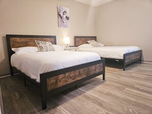 2 bedrooms, desk, iron/ironing board, travel crib