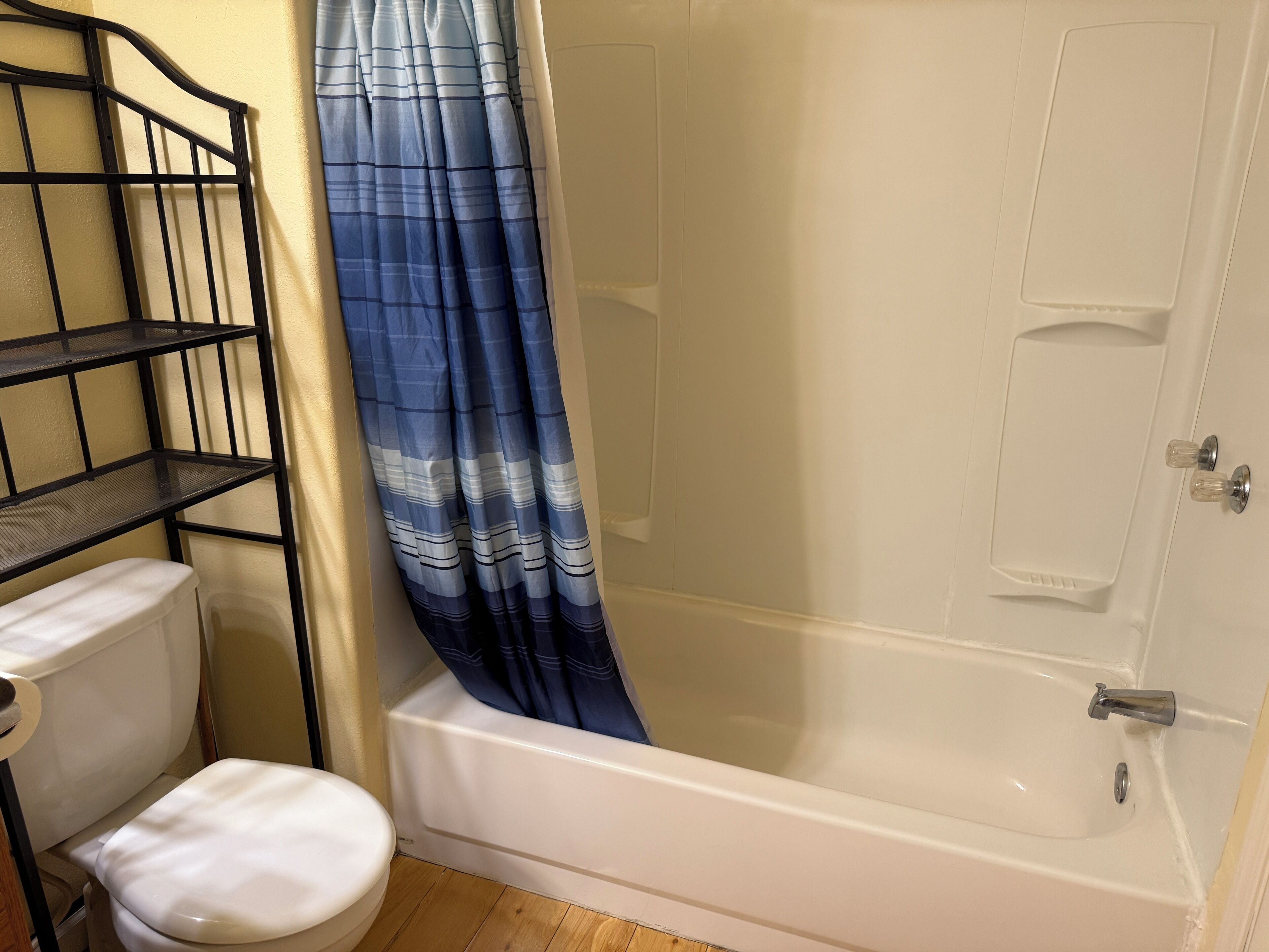 Combined shower/tub, hair dryer, towels, soap