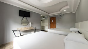 Family Room | Desk, blackout drapes, bed sheets