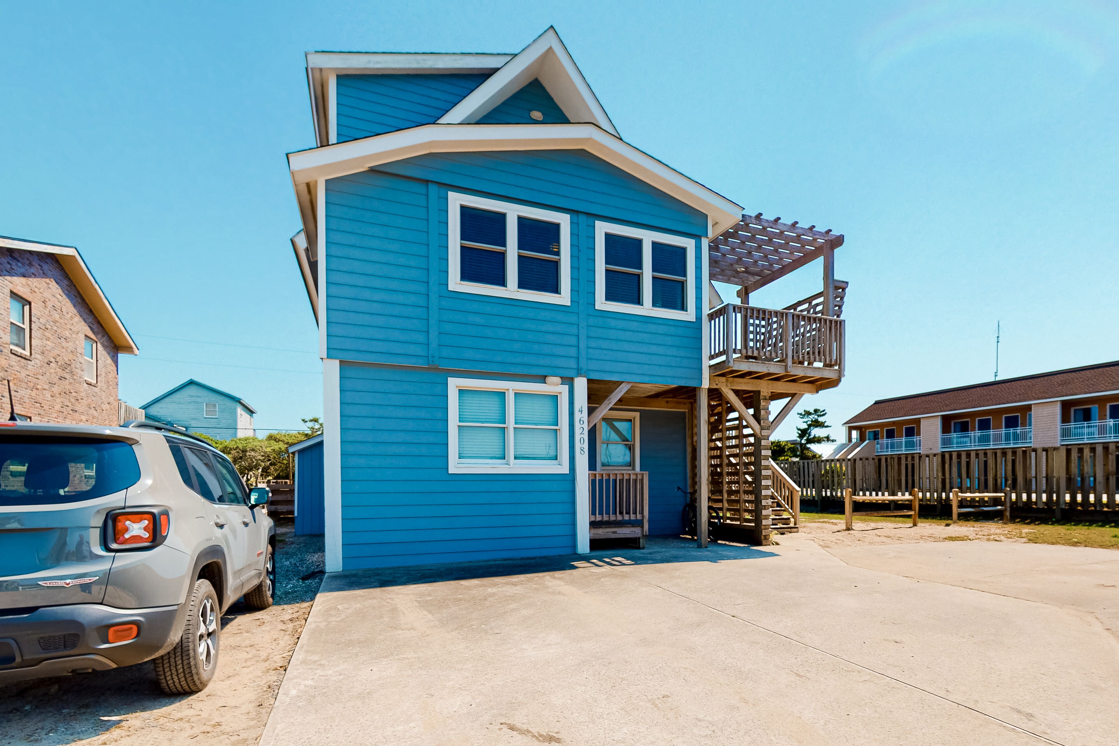 Coastal home with three decks, outdoor shower, AC, & W/D - near beach