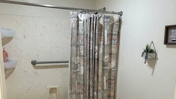 Combined shower/bathtub, hair dryer, towels, soap