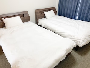 Laptop workspace, free WiFi, bed sheets