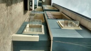 A rooftop with multiple skylights and ventilation systems. - Impeccable 3-Bed Apartment Located in Lagos (Lagos)
