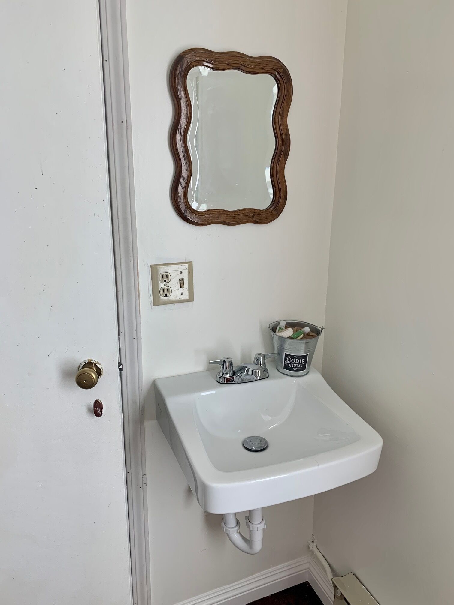 the bunk room | bathroom | designer toiletries, hair dryer, towels