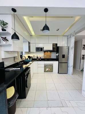 Fridge, microwave, oven, stovetop