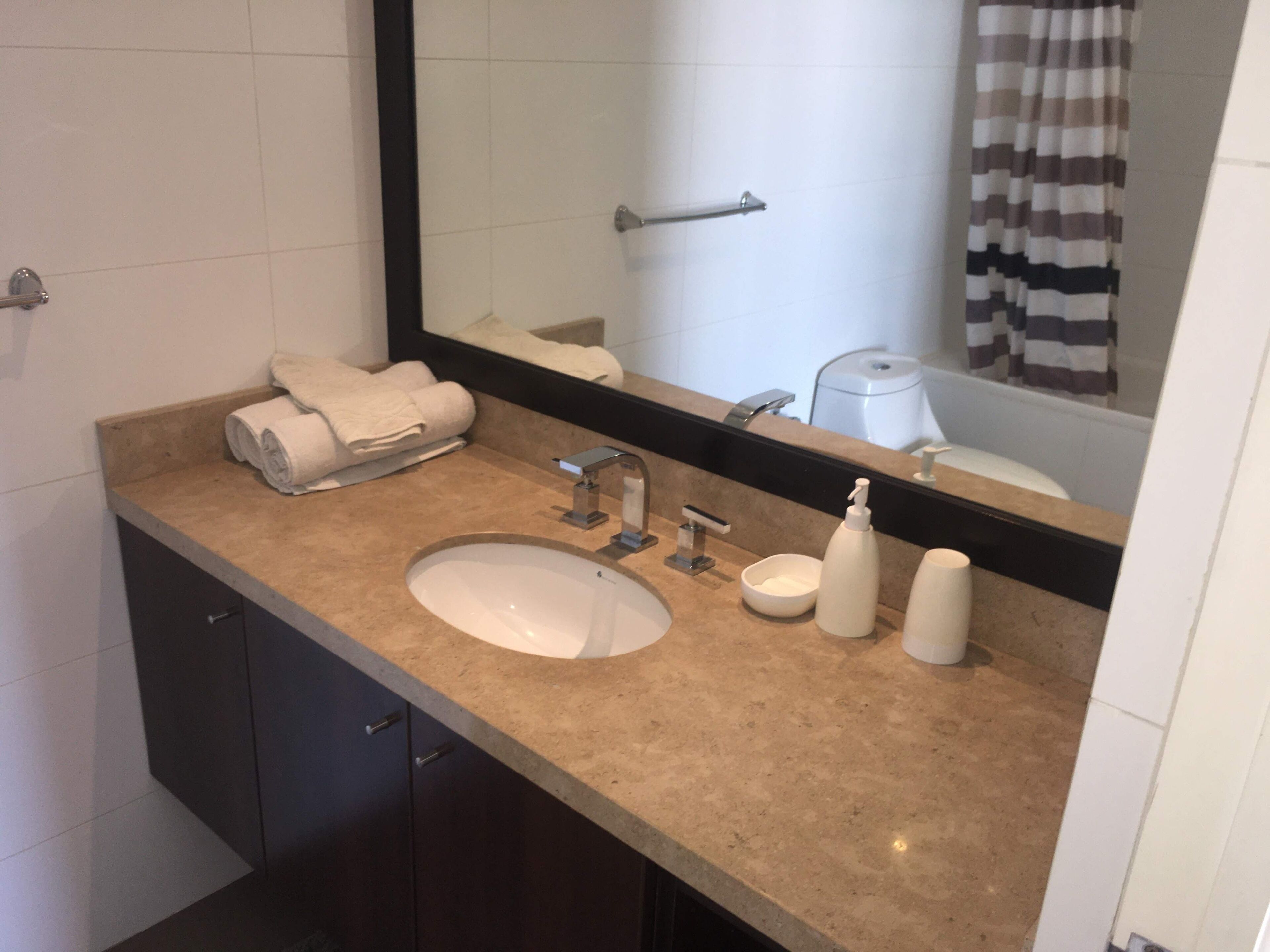 Combined shower/tub, hair dryer, towels, soap