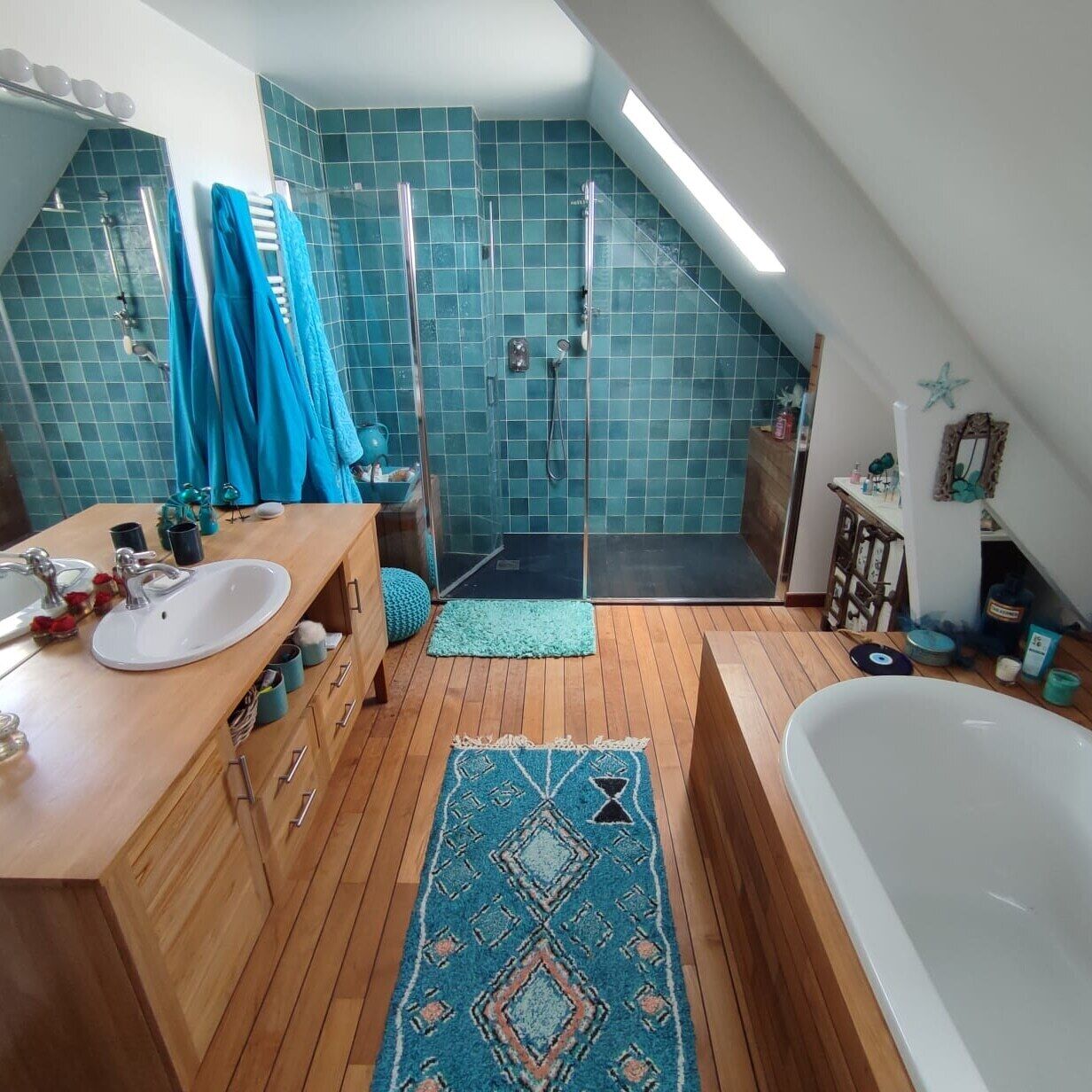 Bathtub, towels, soap, toilet paper