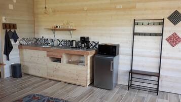 Fridge, microwave, stovetop, coffee/tea maker