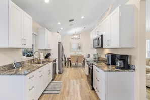 Fridge, microwave, oven, stovetop - CHILL & RELAX - Kayaks, Heated Pool, Gulf Access - Villa Chillax N' Waterways - Roelens Vacations (Cape Coral)