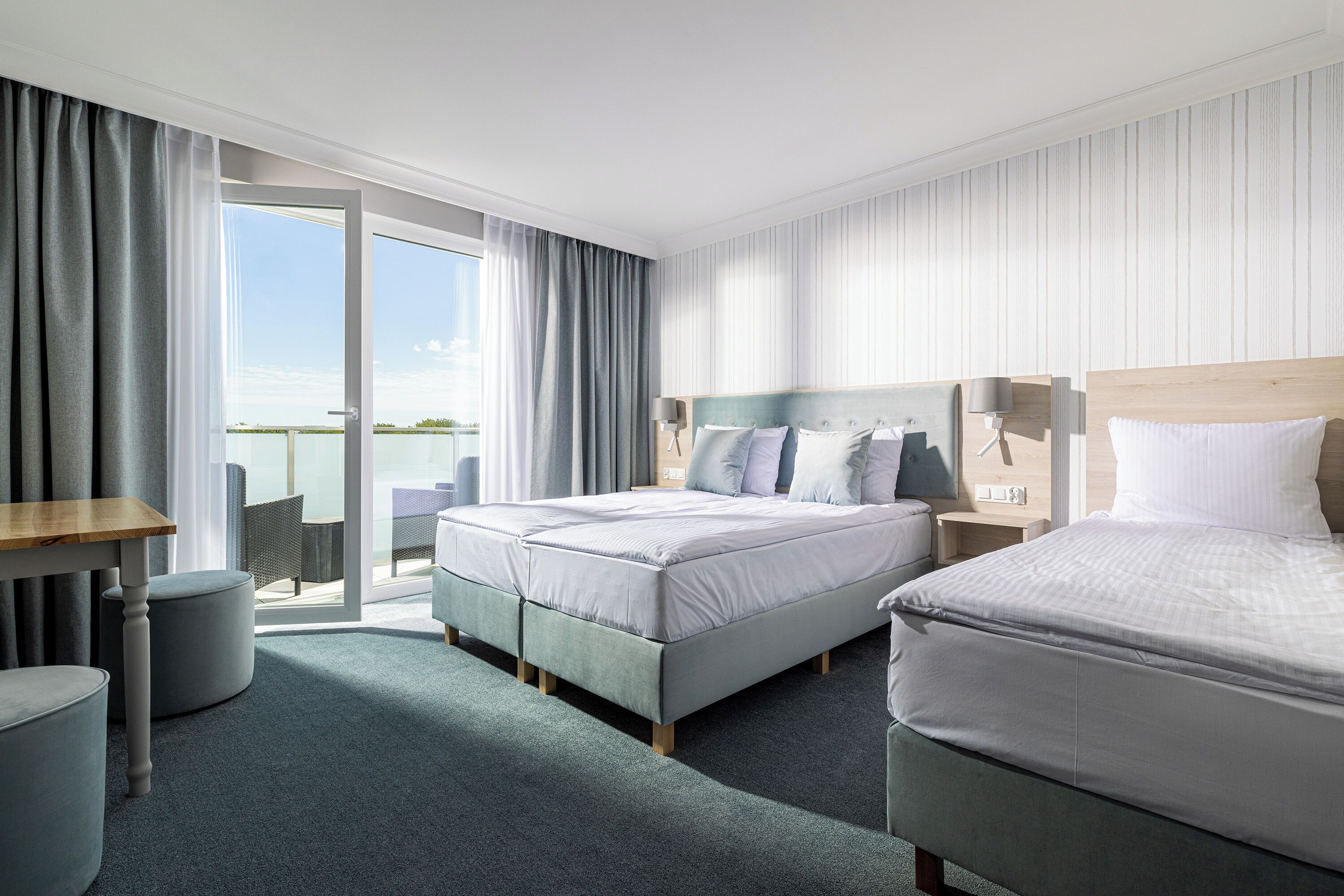 Deluxe Triple Room | Desk, laptop workspace, blackout drapes, free WiFi