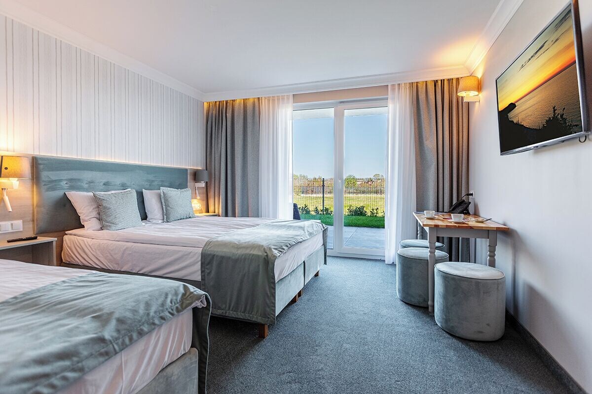 Deluxe Triple Room, Garden View | Desk, laptop workspace, blackout drapes, WiFi (free)